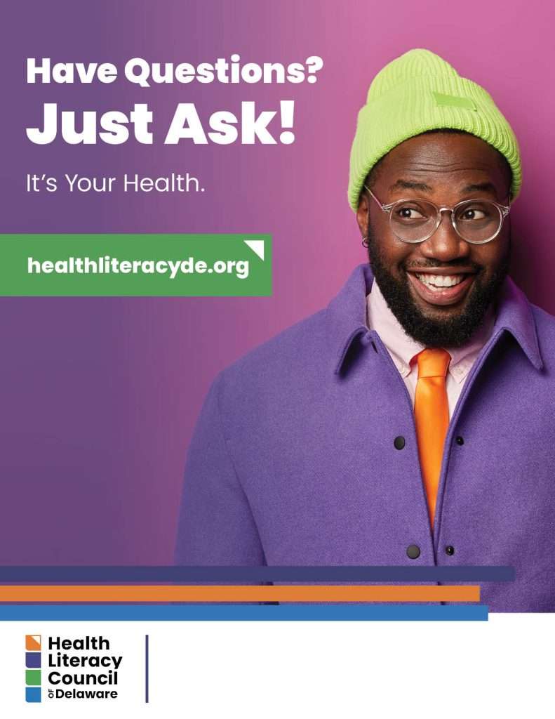 A smiling man in glasses, a neon green beanie, and a purple coat stands in front of a purple background. Text reads “Have Questions? Just Ask! It’s Your Health.” and highlights healthliteracyde.org. Health Literacy Council of Delaware logo appears below.